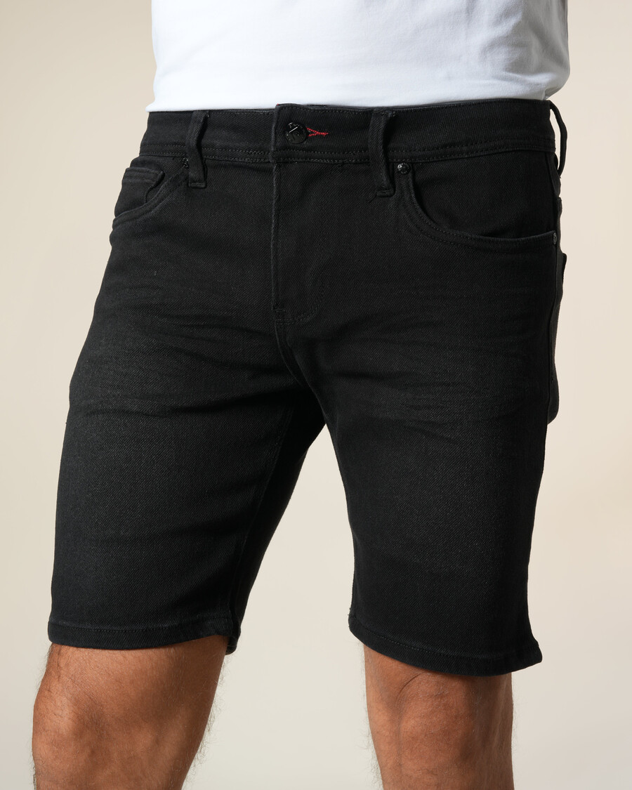 bermuda in denim con toppa in pelle