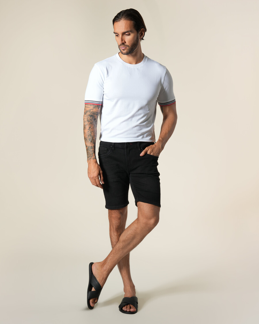 bermuda in denim con toppa in pelle